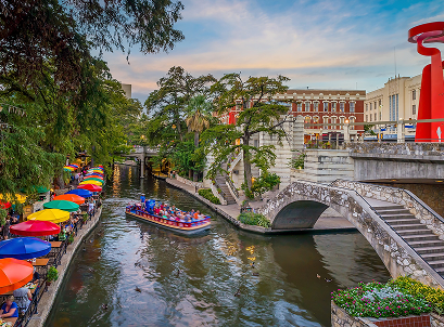 River walk in San Antonio city downtown skyline cityscape of Texas USA